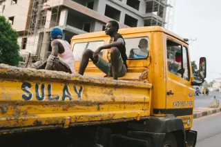People on a truck in Sierra Leone